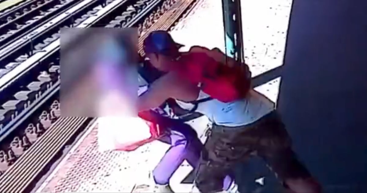 Terrifying video shows man throwing woman onto New York City subway tracks