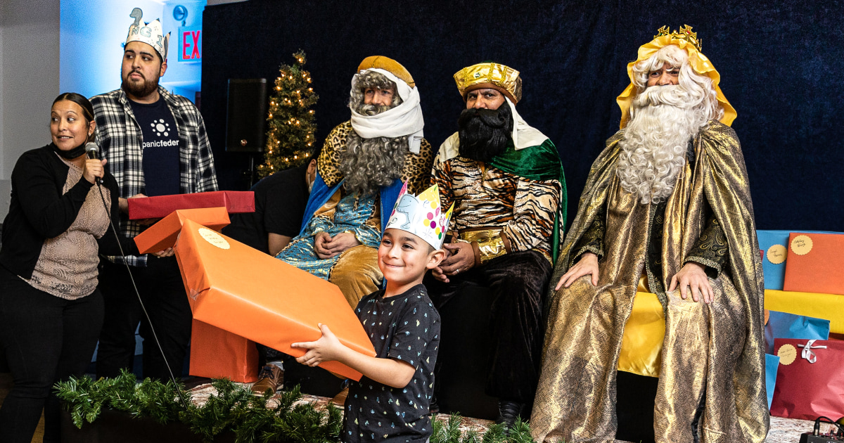 Migrant families seeking asylum welcomed with Three Kings Day celebration in NYC