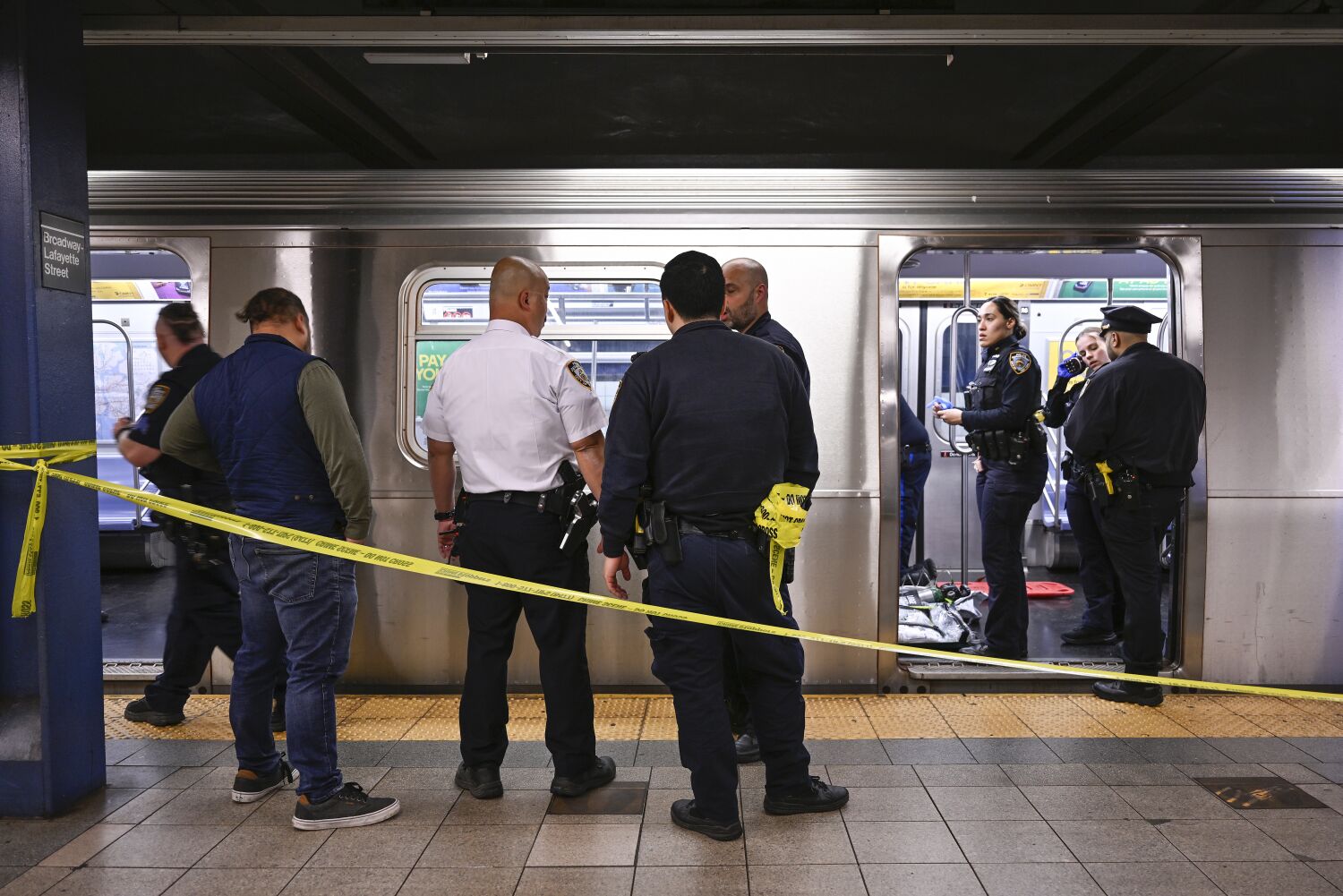 Marine veteran who choked New York subway passenger to death surrenders to authorities