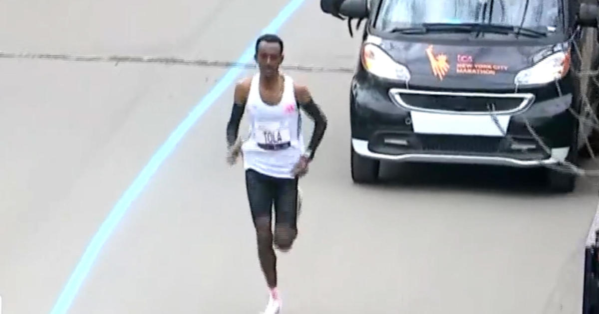 Ethiopia’s Tamirat Tola sets record in New York City Marathon’s men’s race