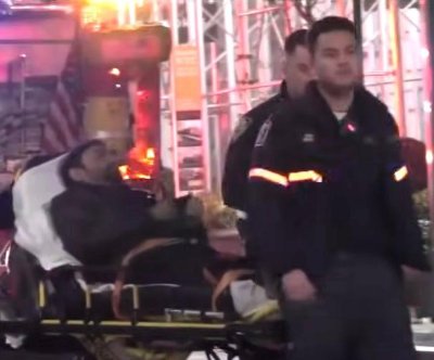 At least 10 hurt when fleeing driver crashes onto NYC sidewalk