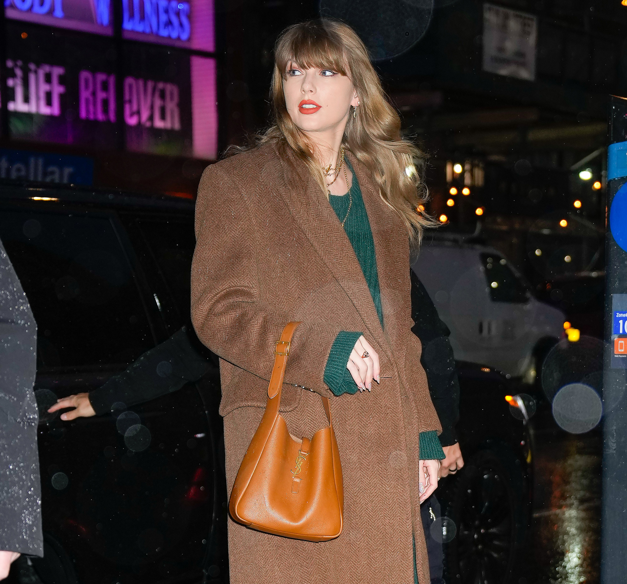 Taylor Swift Returns to Electric Lady Studios in Green Sweater Dress