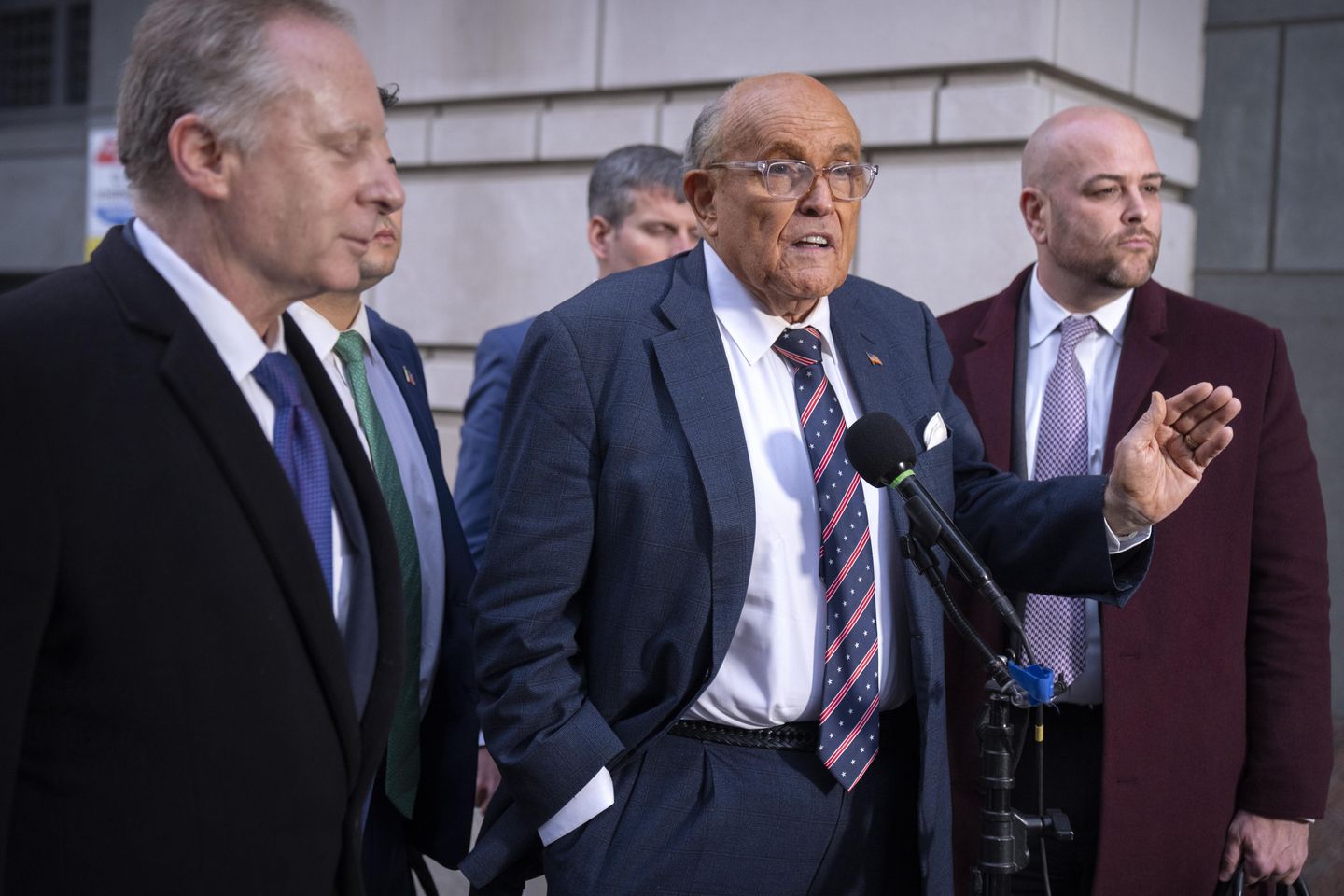 Giuliani settles legal fight with former Georgia election workers and agrees to stop defaming them